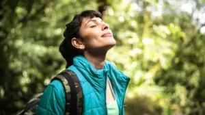Health and Well-being Woman with closed eyes in nature