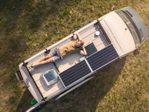 Off-Grid Sustainability Man On Top Of Trailer