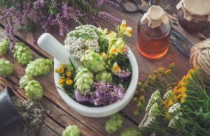 Advantages of Foraging Skills Herbs and Flowers in a Bowl on a table