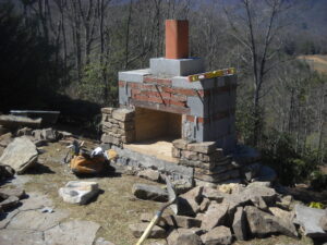 Designing Your Dream DIY Fireplace Outdoor Fireplace Under Construction