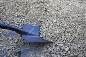Excavate and Gravel Base Shoveling Gravel